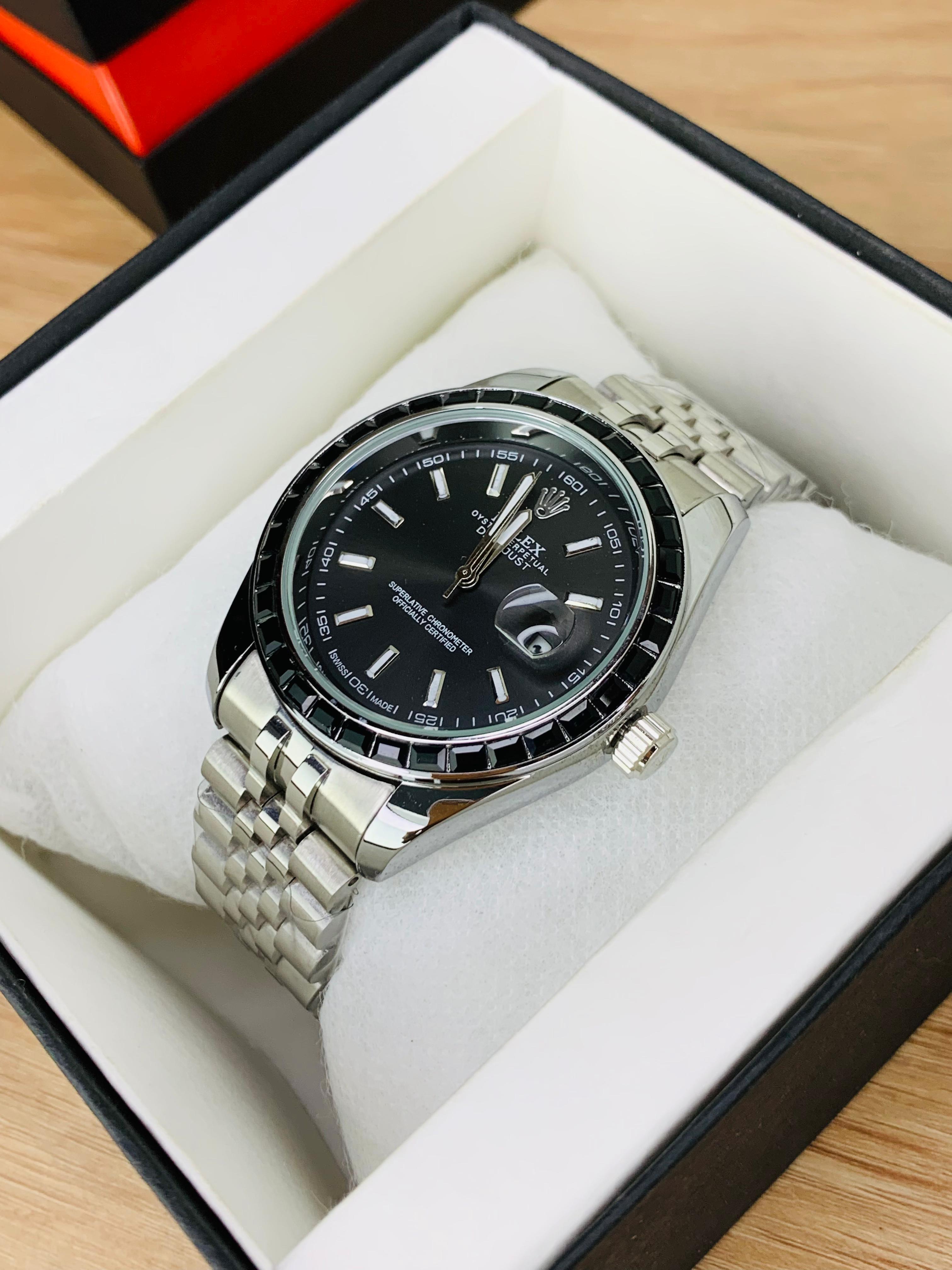  Black Close-up of Rolex Stone Dial black face with date display