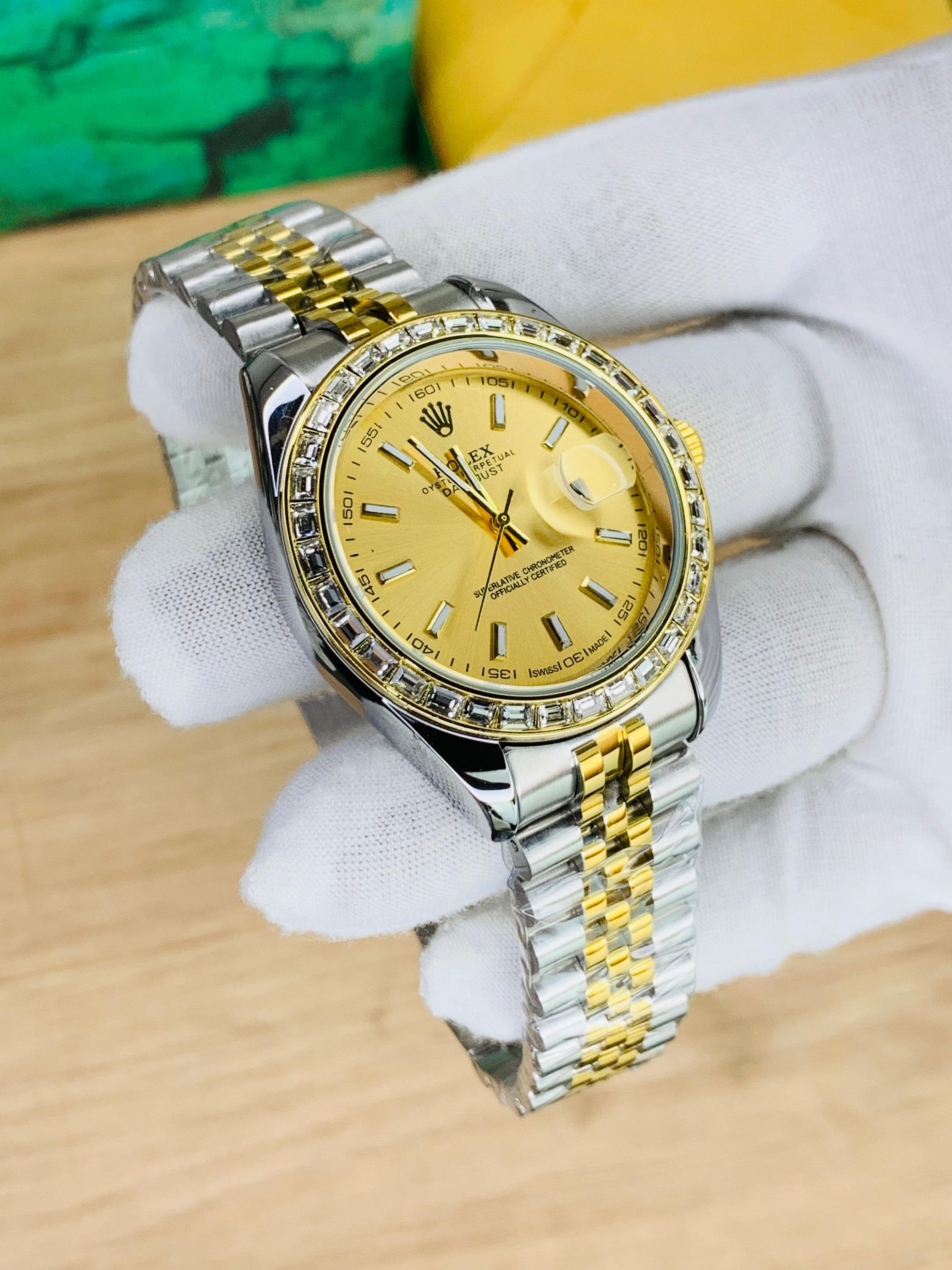 Two-tone stainless steel jubilee chain luxury men’s watch with golden stone dial and date display