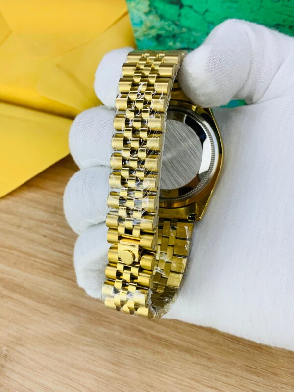 Back-view of Gold and Black Stone Dial stainless steel jubilee Chain watch