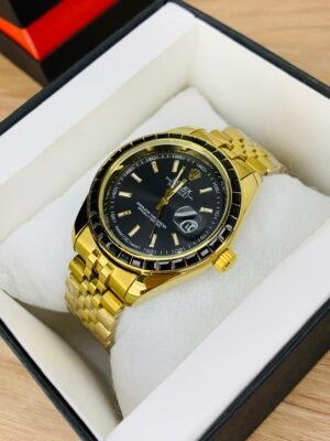 Close-up of Gold  and Black Stone Dial black face with date display